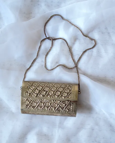 Bolso clutch metálico